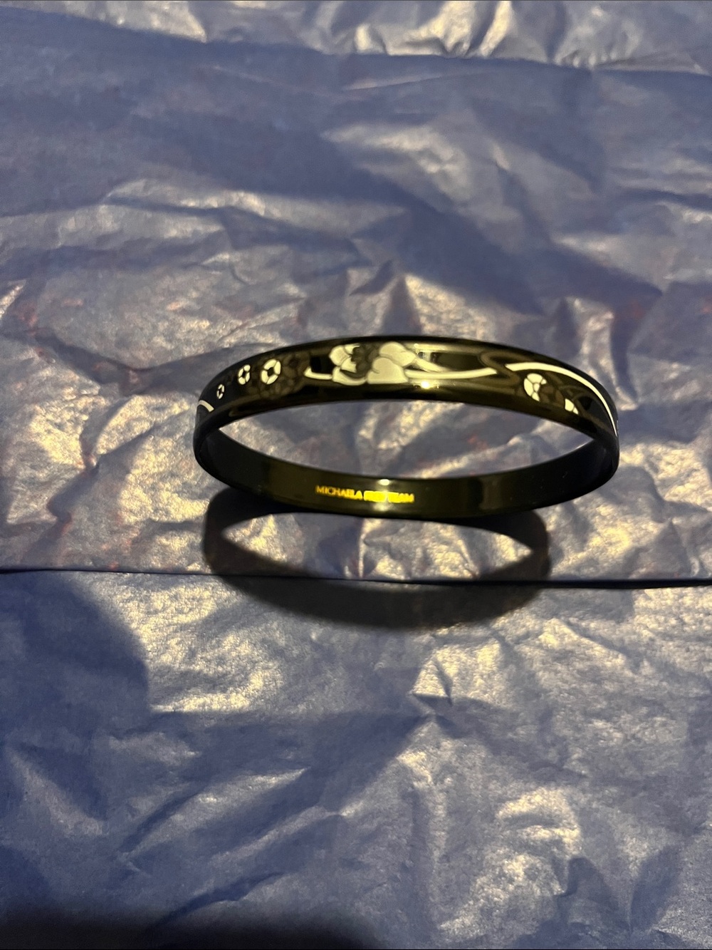 Michaela Frey Team Black Floral Accent Bangle Bracelet with Gold Logo
